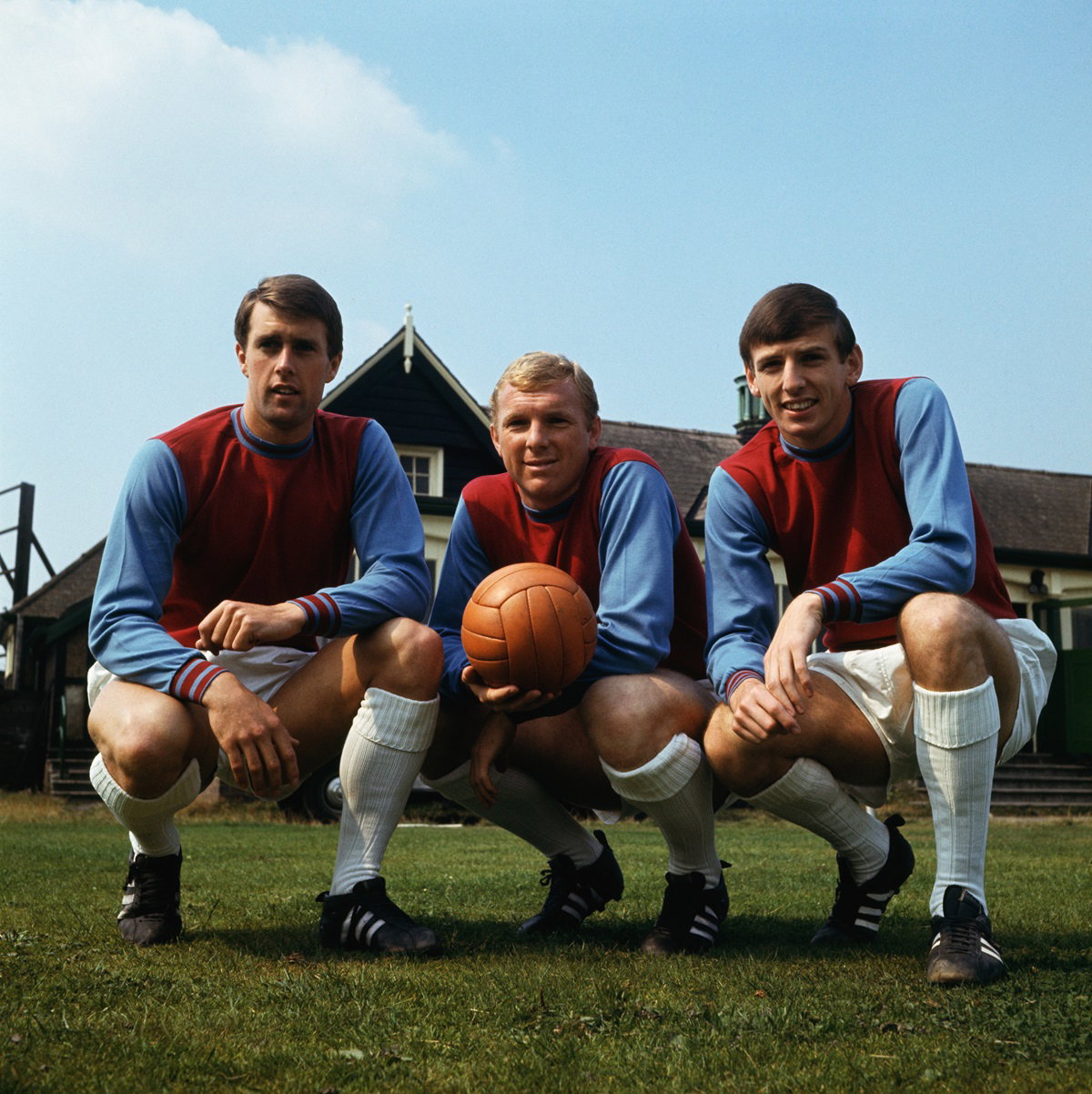 West Ham and England footballers (left to right), Geoff Hurst, Bobby Moore (1941 - 1993) and Martin Peters, 1966. All three are members of the1966 World Cup-winning England team. 